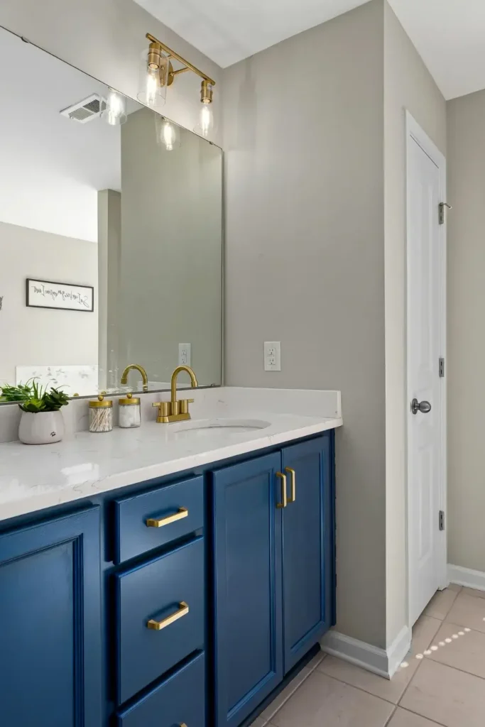 Choose Sleek Blue Cabinets and White Surfaces