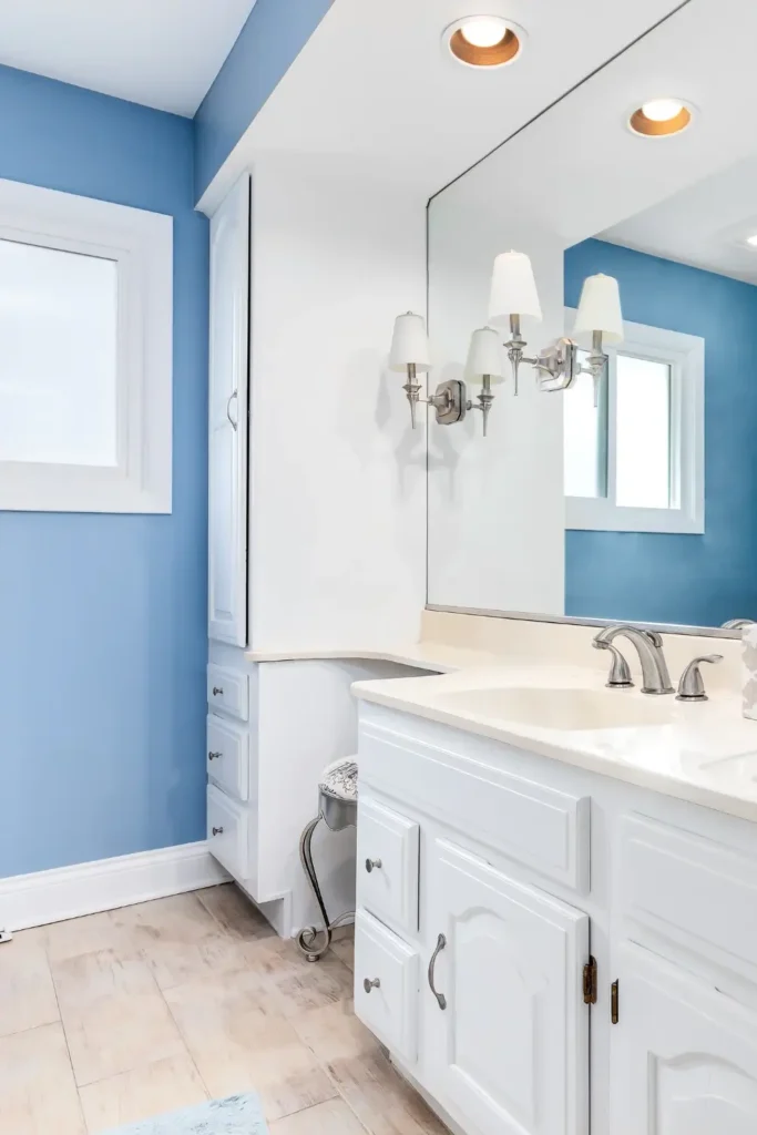 Use Mirrors and Lighting to Make the Room Feel Bigger